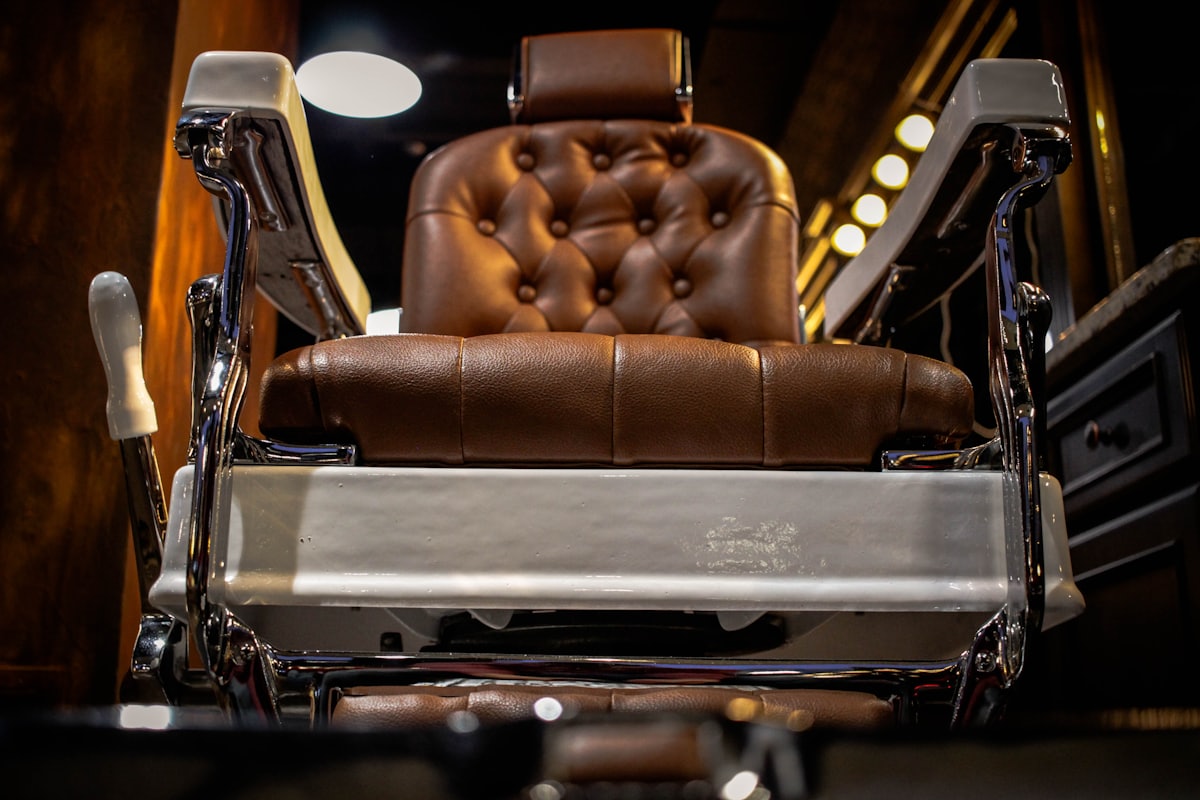 Close-up of the leather chair and barbering tools